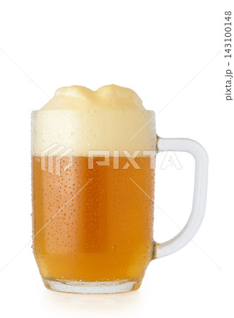 Stock photo of a beer mug with rising foam and condensation 143100148