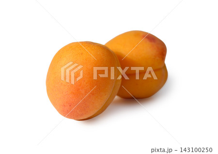 Ripe apricots basking in sunlight, inviting with their vibrant orange glow and sweet aroma 143100250