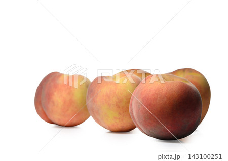 Commercial stock photo of a line of fresh whole ripe peaches on a white background Commercial stock photo of a line of fresh whole ripe peaches on a white background 143100251