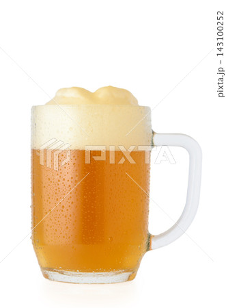 Stock photo of beer mug with stable foam head and water drops Stock photo of beer mug with stable foam head and water drops 143100252