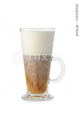 Commercial stock photo of a tall glass of layered latte macchiato on white Commercial stock photo of a tall glass of layered latte macchiato on white 143100502