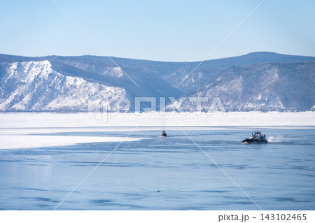 A ship running on Angara river at Listvyanka a town with less than 2,000 inhabitants in Irkutsk Oblast on the shore of Lake Baikal, Russia. A ship running on Angara river at Listvyanka a town with less than 2,000 inhabitants in Irkutsk Oblast on the shore of Lake Baikal, Russia. 143102465