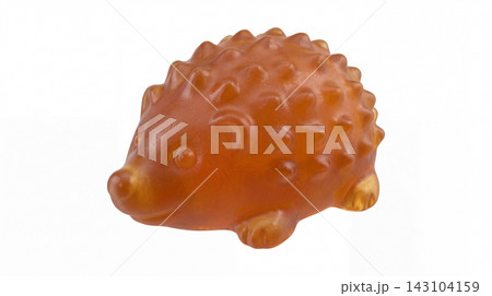 Translucent amber hedgehog gummy candy with hedgehog translucent isolated background confectionery individually delicious appetizing colorful decoration miniature playtime Translucent amber hedgehog gummy candy with hedgehog translucent isolated background confectionery individually delicious appetizing colorful decoration miniature playtime 143104159