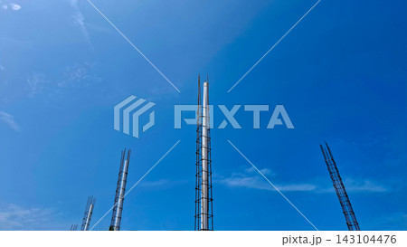Concrete Column Steel Rebar Framework Under Blue Sky Concrete Column Steel Rebar Framework Under Blue Sky 143104476