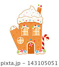 Mitten-shaped gingerbread house. Christmas cookie with sugar icing, a candy cane, and sprinkles, on a white background. 143105051