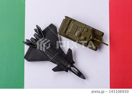 A fighter jet on the Italian flag as a conceptual backdrop representing Europe's defense A fighter jet on the Italian flag as a conceptual backdrop representing Europe's defense 143106930