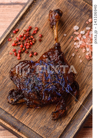 Duck leg confit roasted with salt and allspice. Duck leg confit Duck leg confit roasted with salt and allspice. Duck leg confit 143106940