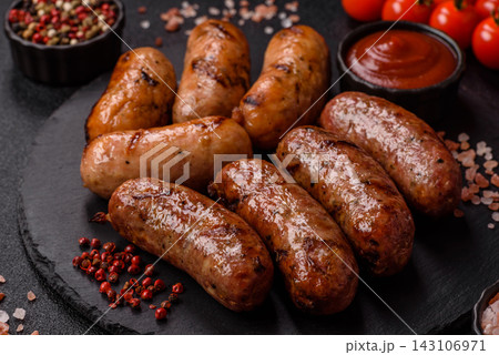 Grilled chicken or pork sausages seasoned with salt and spices. Grilled sausages Grilled chicken or pork sausages seasoned with salt and spices. Grilled sausages 143106971