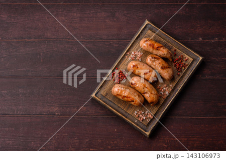 Grilled chicken or pork sausages seasoned with salt and spices. Grilled sausages Grilled chicken or pork sausages seasoned with salt and spices. Grilled sausages 143106973
