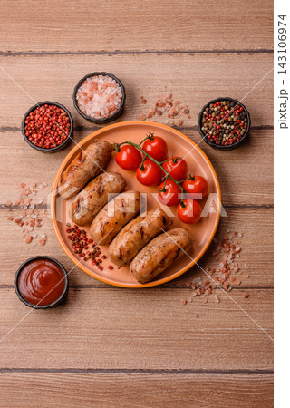 Grilled chicken or pork sausages seasoned with salt and spices. Grilled sausages Grilled chicken or pork sausages seasoned with salt and spices. Grilled sausages 143106974