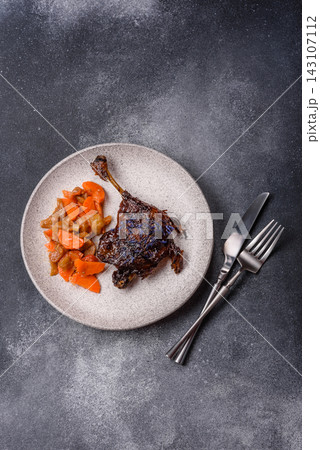 Duck leg confit roasted with salt and allspice. Duck leg confit 143107112