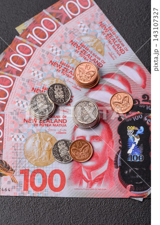 New Zealand paper money, dollar banknotes and cent coins as currency for exchange or travel New Zealand paper money, dollar banknotes and cent coins as currency for exchange or travel 143107327