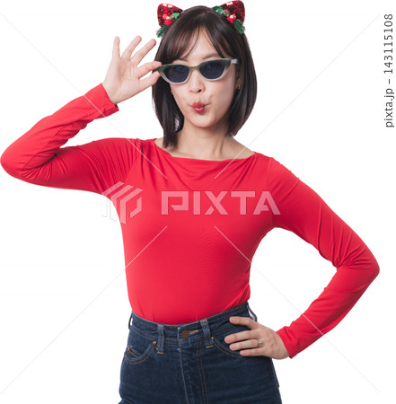 Happy young asian woman adjust sunglasses enjoying christmas sale during black friday shopping seasonal holiday promotion wearing red shirt isolated on transparency background 143115108