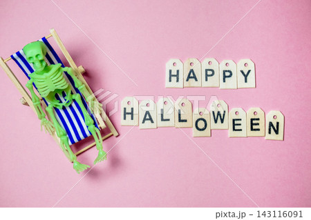 Skeleton Relaxing on Deck Chair with Happy Halloween Tags Skeleton Relaxing on Deck Chair with Happy Halloween Tags 143116091