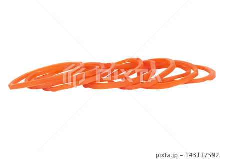 A pile of red rubber bands isolated on white background A pile of red rubber bands isolated on white background 143117592
