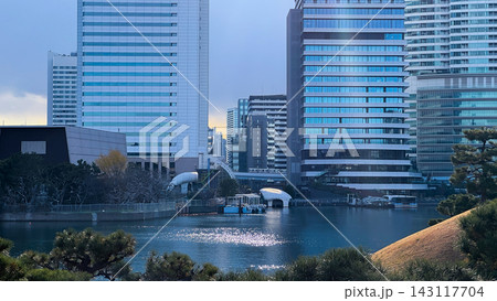 Modern Office Towers Reflected in a Tokyo Waterfront Canal 143117704