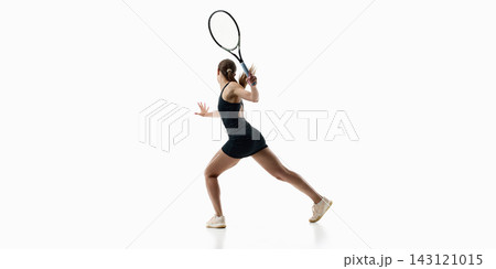 Female tennis player taking long athletic stride with raised racket on white background 143121015