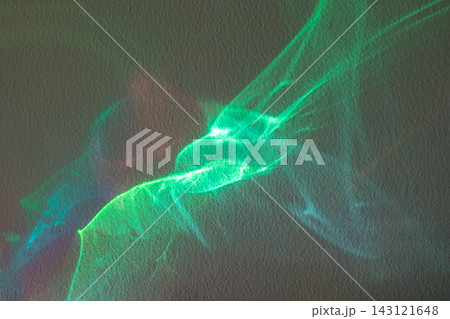 Abstract light projection on textured wall with green neon wave and motion blur 143121648