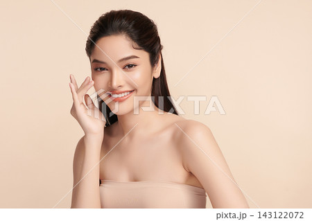 Beautiful Young transgender woman with clean fresh skin on beige background, Face care, Facial treatment, Cosmetology, beauty and spa, transgender women portrait. Beautiful Young transgender woman with clean fresh skin on beige background, Face care, Facial treatment, Cosmetology, beauty and spa, transgender women portrait. 143122072