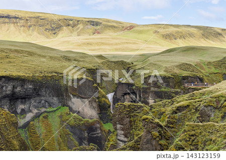 Mogafoss waterfall amid moss covered cliffs of Fjadrargljufur canyon, Iceland 143123159