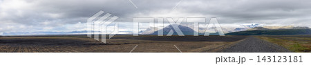 Gravel road across Skeidararsandur toward distant mountains in Iceland Gravel road across Skeidararsandur toward distant mountains in Iceland 143123181