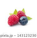 sweet raspberries with blueberries on white backgrounds 143123230