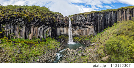 Svartifoss waterfall amid columnar basalt cliffs in Skaftafell, Iceland Svartifoss waterfall amid columnar basalt cliffs in Skaftafell, Iceland 143123307