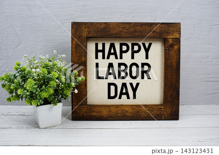 Happy Labor Day text written on wooden board Happy Labor Day text written on wooden board 143123431