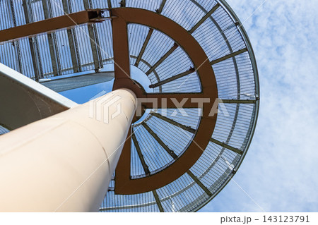 Underside view of geometric glass and metal architecture framework Underside view of geometric glass and metal architecture framework 143123791