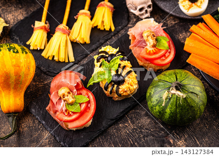 Halloween appetizers. Assortment of snack, food, party buffet Halloween appetizers. Assortment of snack, food, party buffet 143127384