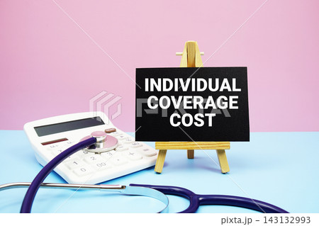 IVF Cycle Cost text with stethoscope and calculator on pink and blue background 143132993