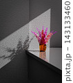 A flower in a mug 143133460
