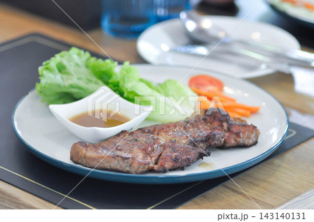 pork steak or grilled pork and salad or pork chop and vegetable pork steak or grilled pork and salad or pork chop and vegetable 143140131