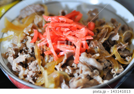 stir fried beef with vegetable and rice or Rice topped with stir fried pork or stir fried beef or Japanese food or Korean food or Beef Rice Bowl , Gyudon 143141013
