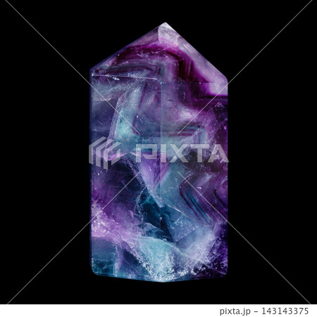 Polished Rainbow Fluorite Crystal Point on Black Background Polished Rainbow Fluorite Crystal Point on Black Background 143143375