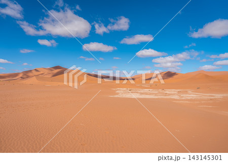 Red Sand Dunes Under Clear Sky In Sossusvlei Desert In Namibia Red Sand Dunes Under Clear Sky In Sossusvlei Desert In Namibia 143145301