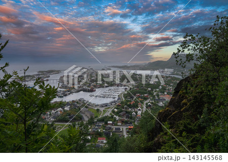Town and harbour of Svolvaer seen from a mountain trail in Norway Town and harbour of Svolvaer seen from a mountain trail in Norway 143145568