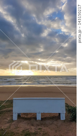 Beach Bench at Sunset 143150217