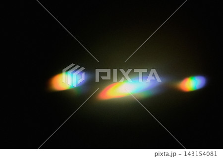Abstract colorful light refracting, creating vibrant spectrum effect on dark background Abstract colorful light refracting, creating vibrant spectrum effect on dark background 143154081