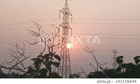 electricity pylon and wires in sunset electricity pylon and wires in sunset 143156644