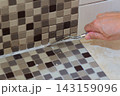 DIY Bathroom Tile Grout Removal and Repair 143159096