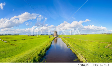 Aerial drone view of traditional windmills in the Netherlands. Panoramic view. 143162603