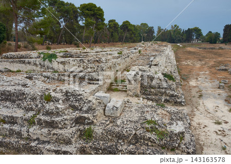 Stone remains of the ancient Altar of Hieron II at the Neapolis archaeological site, Syracuse, Sicily 143163578