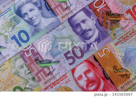 New Zealand paper money, dollar banknotes and cent coins as currency for exchange or travel New Zealand paper money, dollar banknotes and cent coins as currency for exchange or travel 143165097