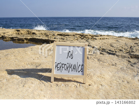 Job Performance symbol. White blackboard with Concept words Job Performance. Beautiful sea background. Business and Job Performance concept. Copy space. 143166802
