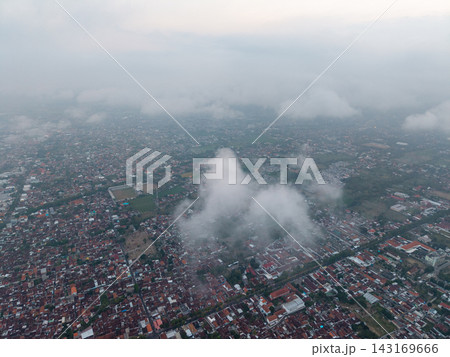 Cloudy Aerial Panorama Over Banyuwangi Urban Neighborhoods and Rooftops Cloudy Aerial Panorama Over Banyuwangi Urban Neighborhoods and Rooftops 143169666