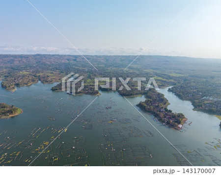 Aerial View of Serene Lake with Floating Fish Farms and Islands Aerial View of Serene Lake with Floating Fish Farms and Islands 143170007