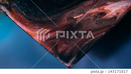 Sparkling paint. Acrylic particles. Defocused blue orange purple color shiny art triangle mix texture spilling on abstract background. Sparkling paint. Acrylic particles. Defocused blue orange purple color shiny art triangle mix texture spilling on abstract background. 143171817
