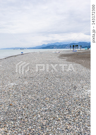 pebble beach in Batumi city on cloudy autumn day pebble beach in Batumi city on cloudy autumn day 143172300