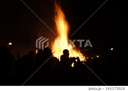 Crowd and fire at night in a summer event Crowd and fire at night in a summer event 143173028